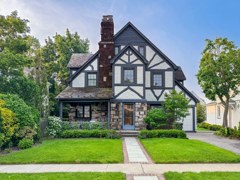 Tudor-style house with slate and shingle roof